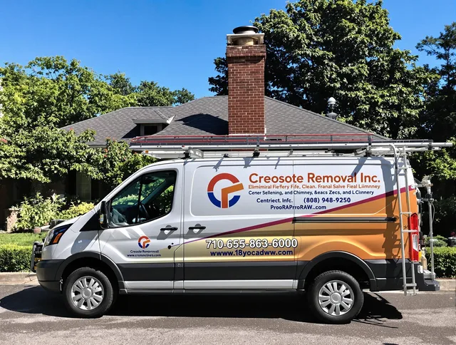 Burrillville Chimney Sweep technician removing creosote safely in Burrillville, RI